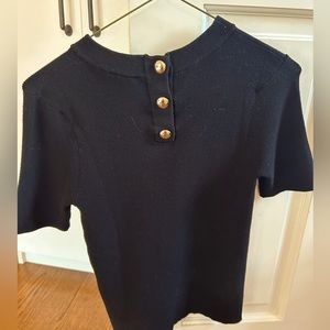 Black Sezane jumper with gold buttons on back. Size XS